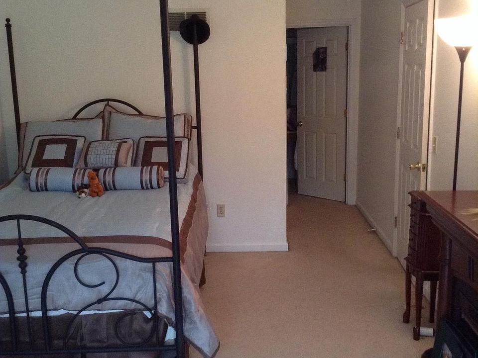 View of master bedroom and door to master bath