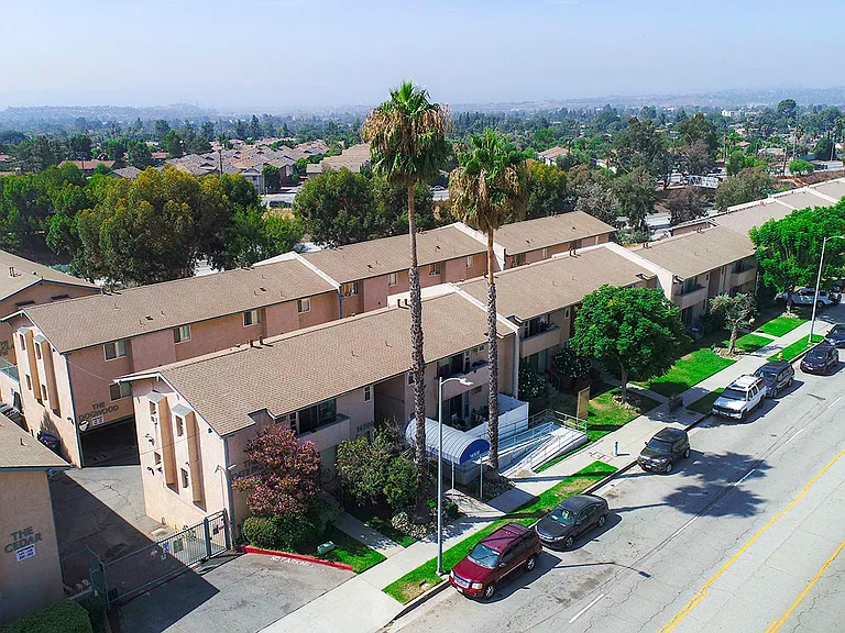 Aerial drone view of Olive View Gardens' five free-standing buildings..