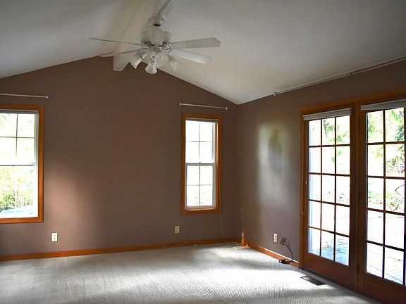 Master Bedroom with French doors leading to deck and hot tub