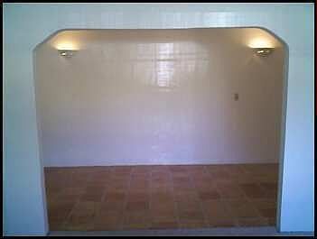 Formal Dining Room through Arch