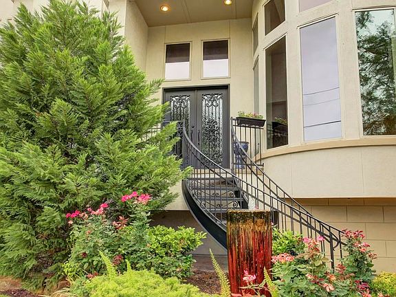 Elevated front door leading to the living room.