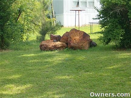 Lg iron rocks( trl in back ground is now gone)