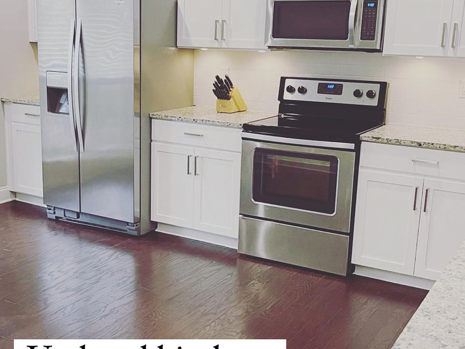 Kitchen recently updated with paint, backsplash, and hardware!