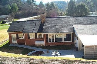 This roomy brick rancher has it all on one floor!