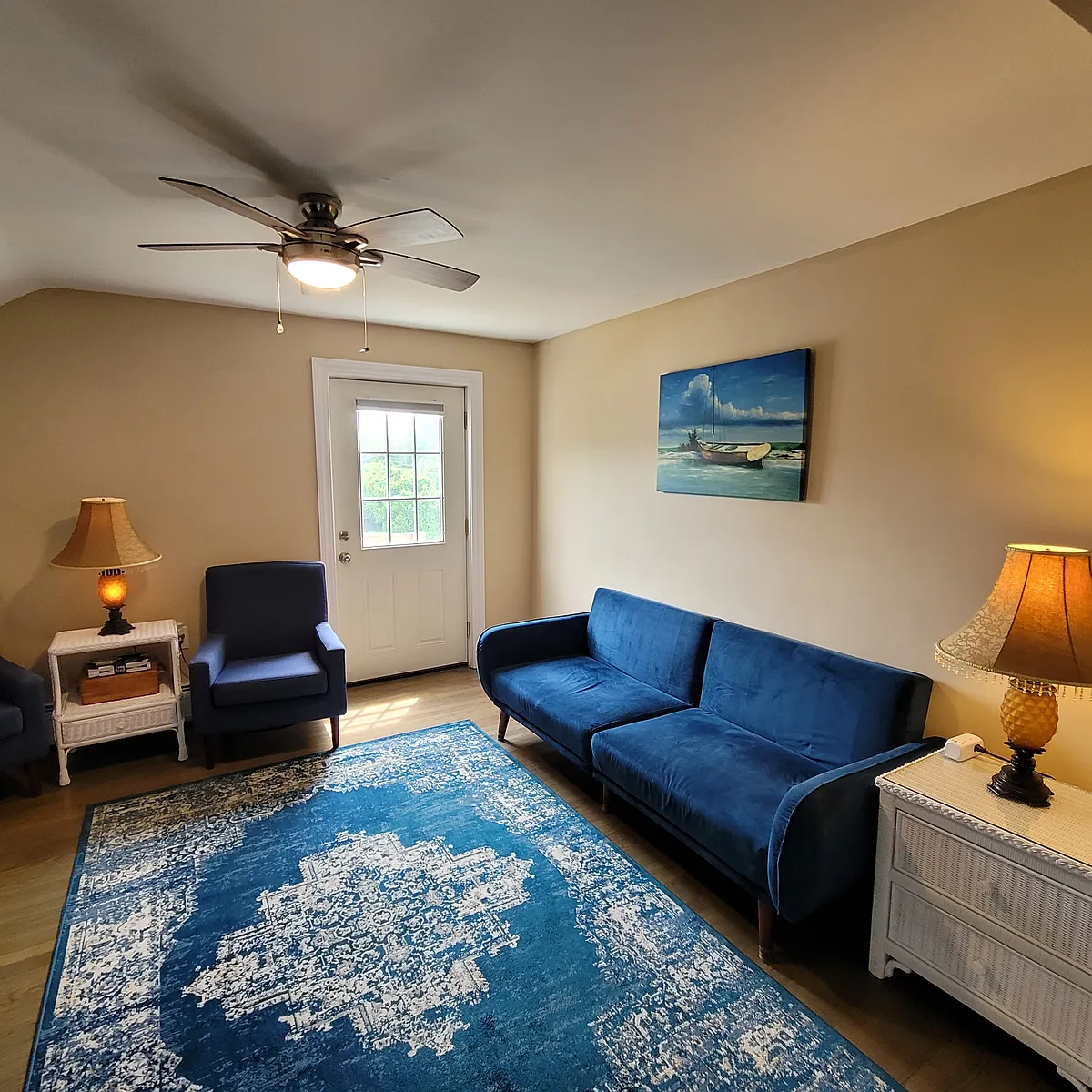 Living room with door to small outdoor balcony - 1235 Gardners Neck Rd #2