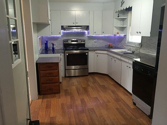 dishwasher, stove, and fridge provided