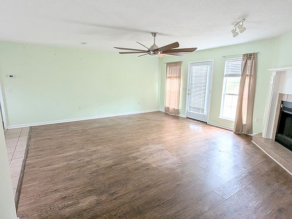 Very large family room with huge ceiling fan
