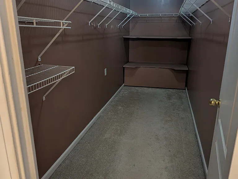 Walk in closet for master bedroom
