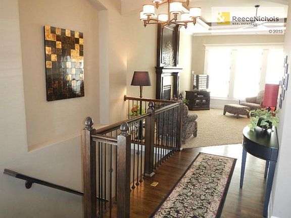 This stunning entry is only the beginning...gleaming wood floors