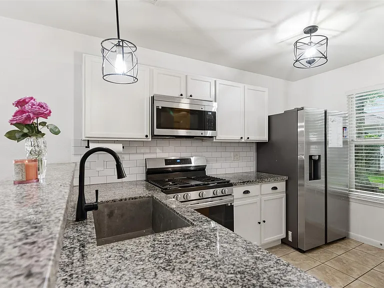 6136 Lone Prairie Way — Photo 3