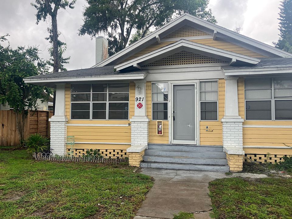 Front of apartment and entrance from street.