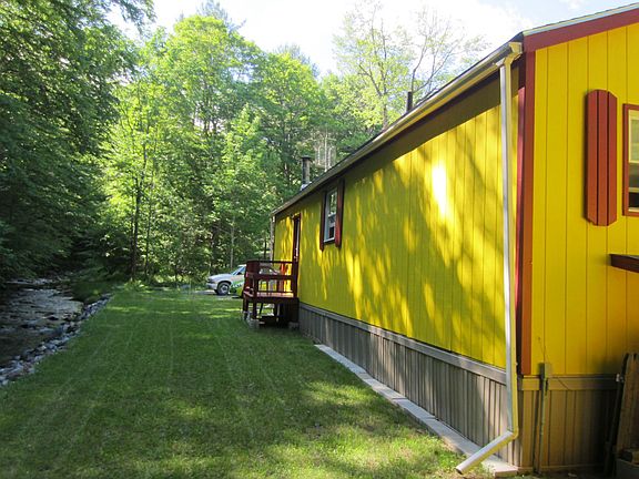 Rear view, brook to left