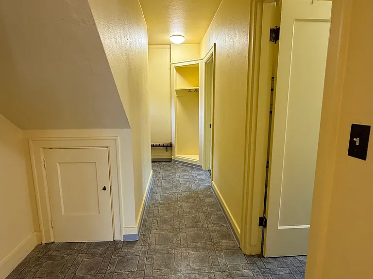 Hallway from Dining room to downstairs bedroom and bath