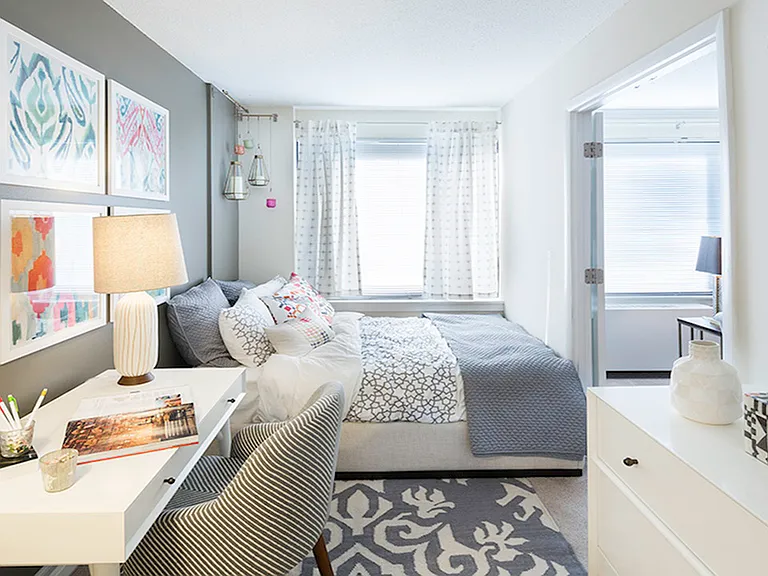 Expansive bedrooms with plush wall-to-wall carpeting