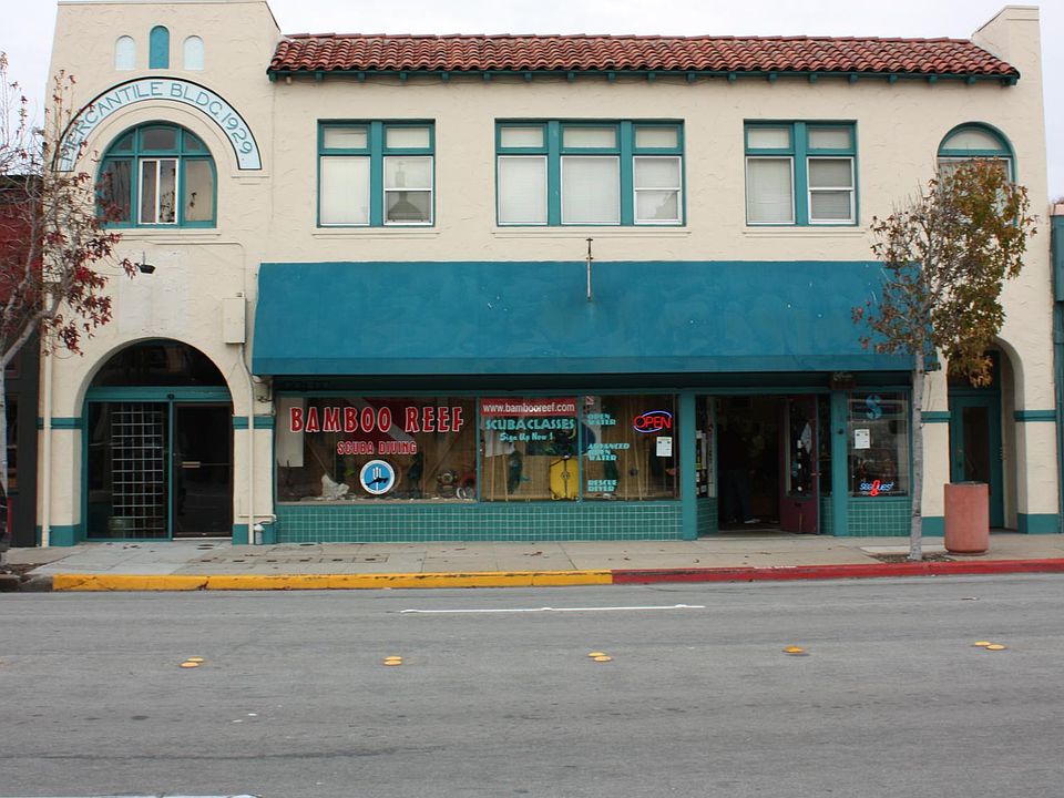 Apartments upstairs, commercial units downstairs. Entrance to upstairs is the far right door.