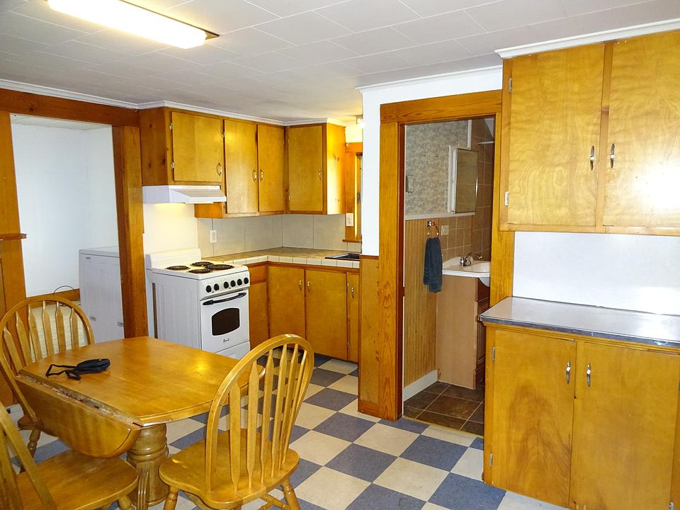 Eat in Kitchen! Bright, Sunny, Perfect! Hub, living room, bath & both bedrooms all accessible from here. New oven in 2020.