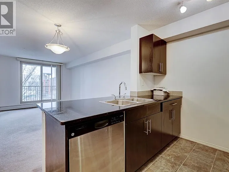 403 Mackenzie Way SW #7210 — Photo 5