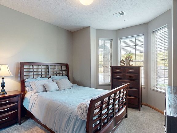 Wake up refreshed in your spacious, sunlit bedroom.