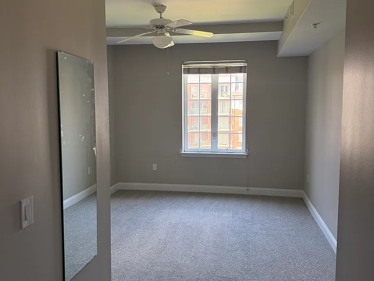 View from unit bathroom to bedroom