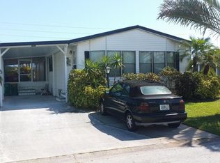 606 Amaryllis Dr, Barefoot Bay, FL 32976