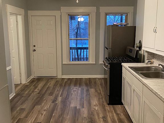 Kitchen with rear exit to mud room and deck