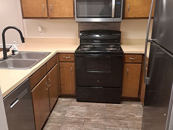 View of Kitchen, New Range, New Micro Wave, New Refreg, New Dishwasher, New tile floor