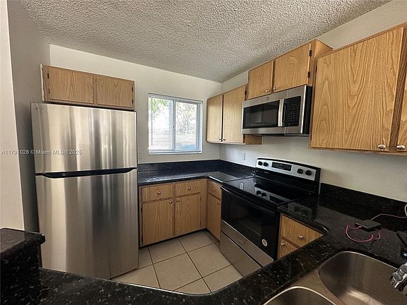 5th image of 8750 N Sherman Cir APT 102