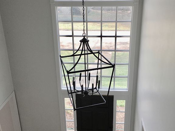 Foyer light fixture and wind