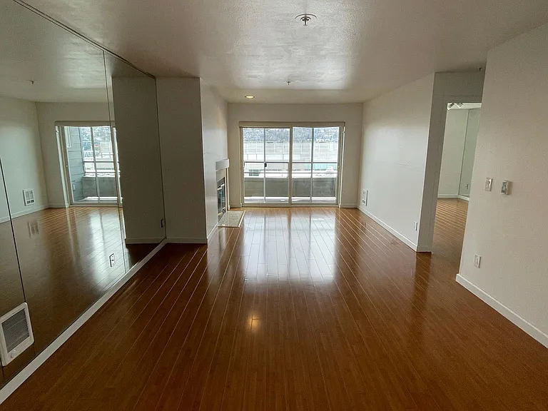 Opens to large living room with wood burning fireplace and view deck!