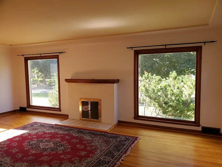 Living room with a gas fireplace.