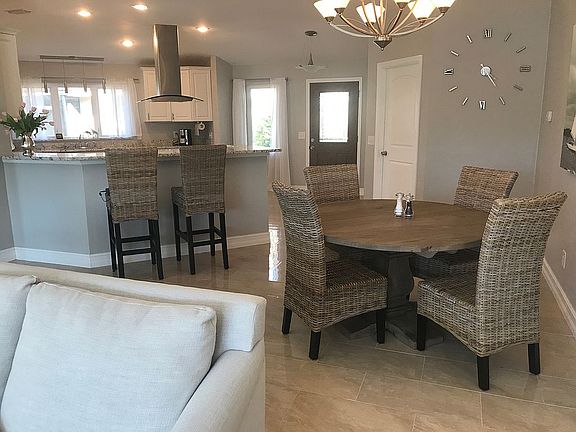 Dining area + breakfast bar.