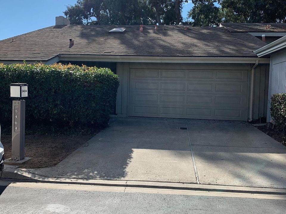 End unit with an attached two car garage