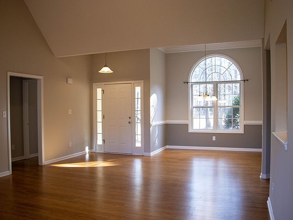 Living/dining room with newly refinished hardwood floors