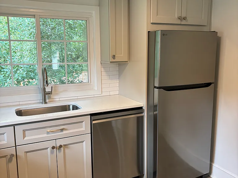 New appliances-stainless steel dishwasher and fridge/freezer.
