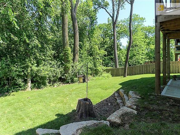Enjoy your private nature reserve with green space behind the home!