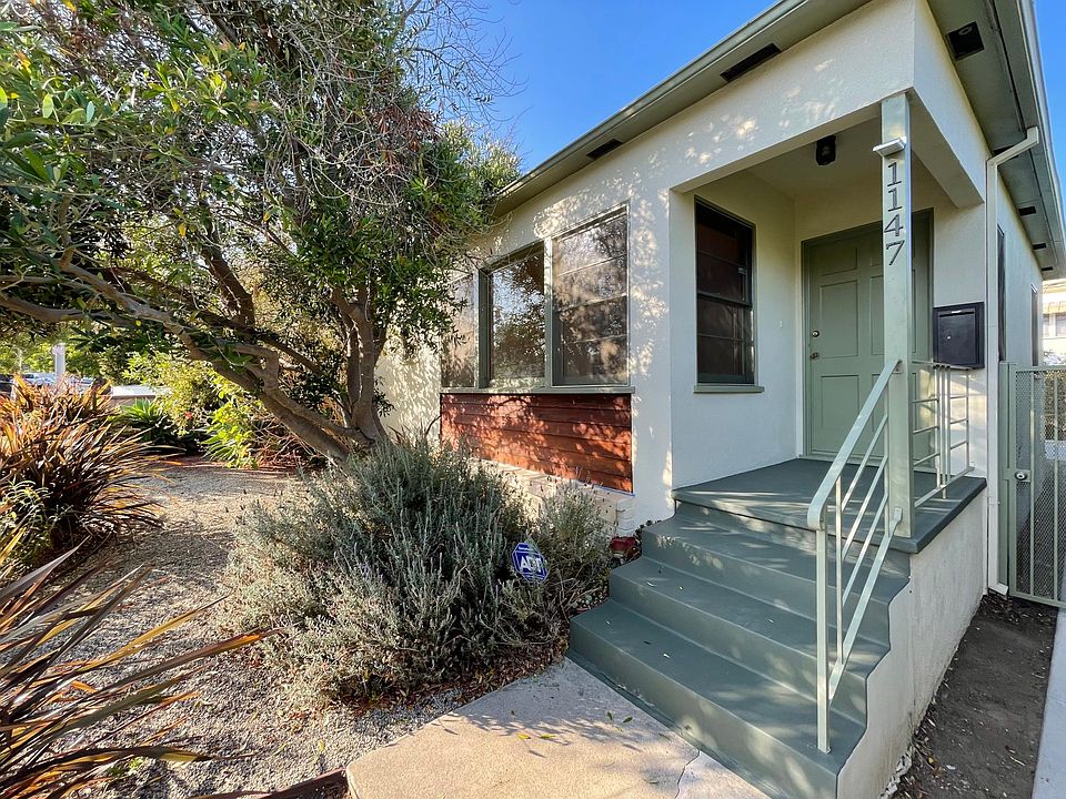 Attractive curb appeal and climate-friendly, privacy landscaping.