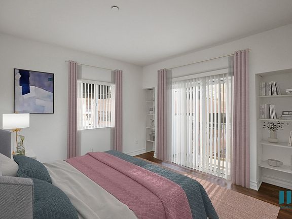 Bedroom with Built-In Shelving, Large-Size Windows, and Patio