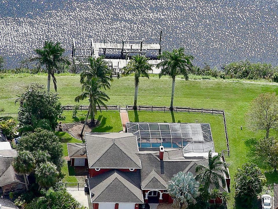 Situated on 1.5 lots, this beautiful waterfront property provides the features of a resort while maintaining the peace and privacy you're looking for.