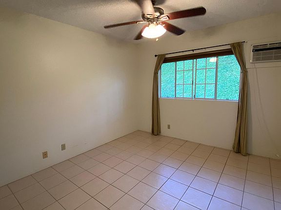 Bedroom with a/c unit