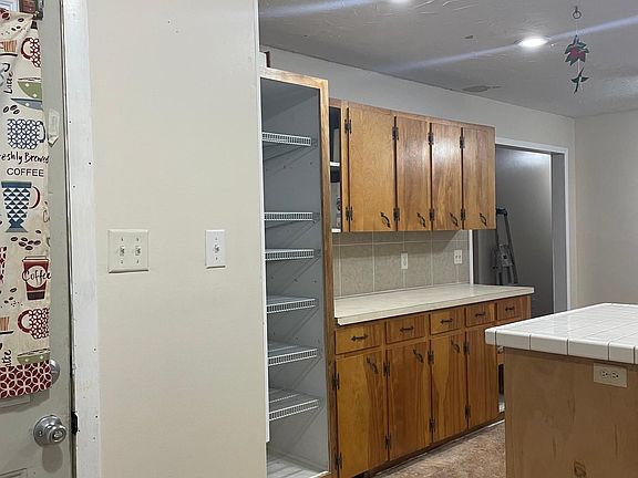 built in pantry and tons of cabinet space