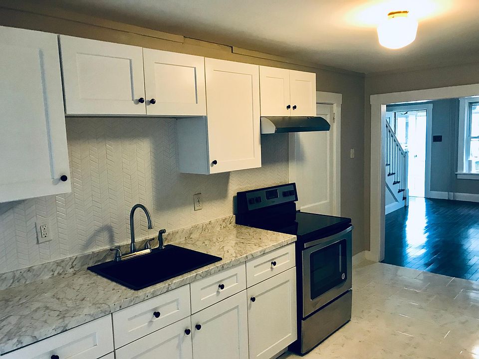 New stainless steel appliances with renovated kitchen