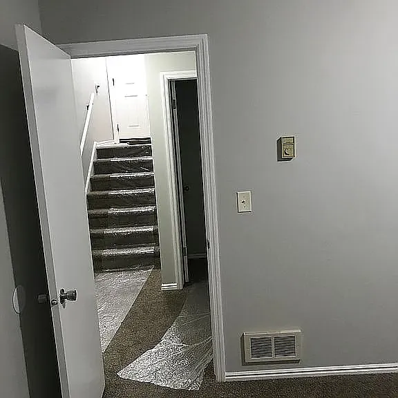 Stairs leading to bedrooms downstairs.