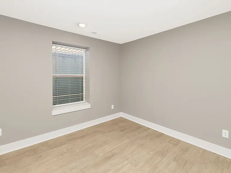 4th bedroom in lower level with view out window