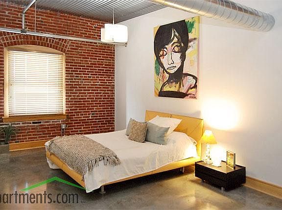 Exposed brick, contemporary style, master suites with attach