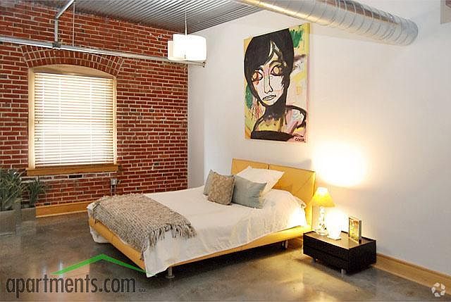 Exposed brick, contemporary style, master suites with attach