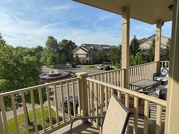 balcony, railing separates neighbor's section