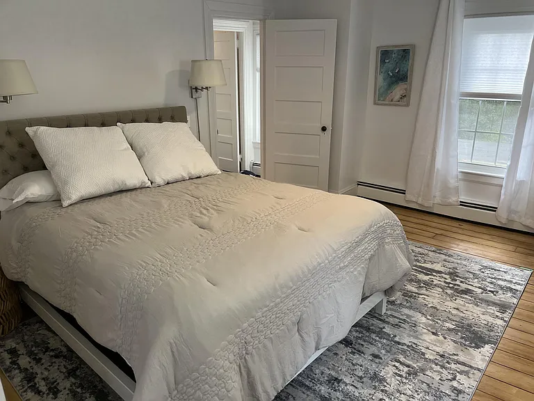 Bedroom- new bed, mattress, linens etc. Bright room. Lots of window.
