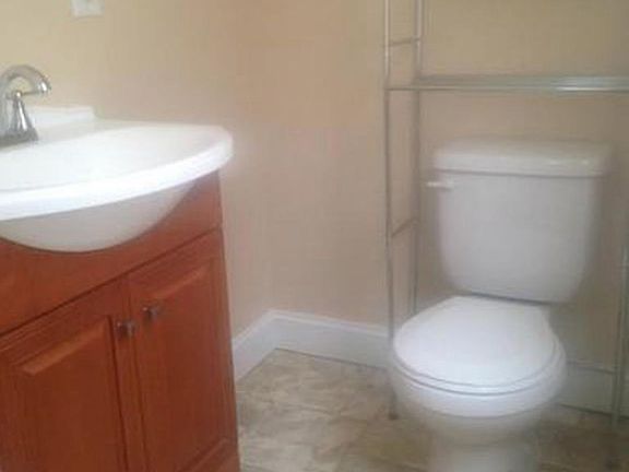 Half bathroom in the back of the house