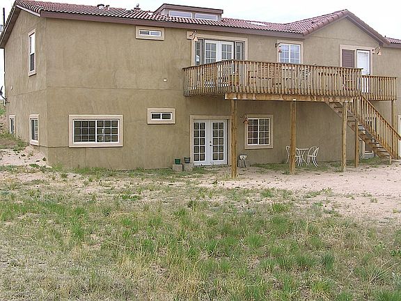 Back of home w/walk out