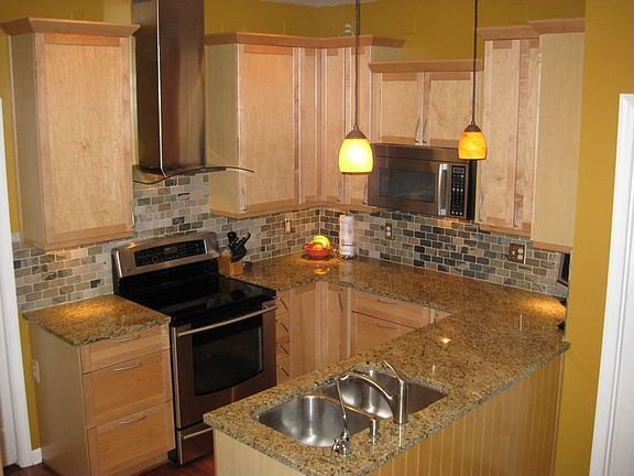 All new kitchen with top of the line appliances, maple cabinets, granite tops.